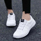 Women in White Sneakers 