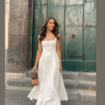 Women Model Wearing Elegant White High Waist Dress