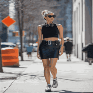 Women Model Wearing vintage leather black skirt front view