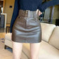 women Wearing vintage leather brown skirt