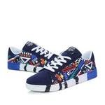 GRAFFITI LACE-UP SNEAKERS.