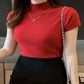 Women Model Wearing Red High Neck Tops.